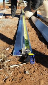 measuring aluminum rails for solar array off grid home farm