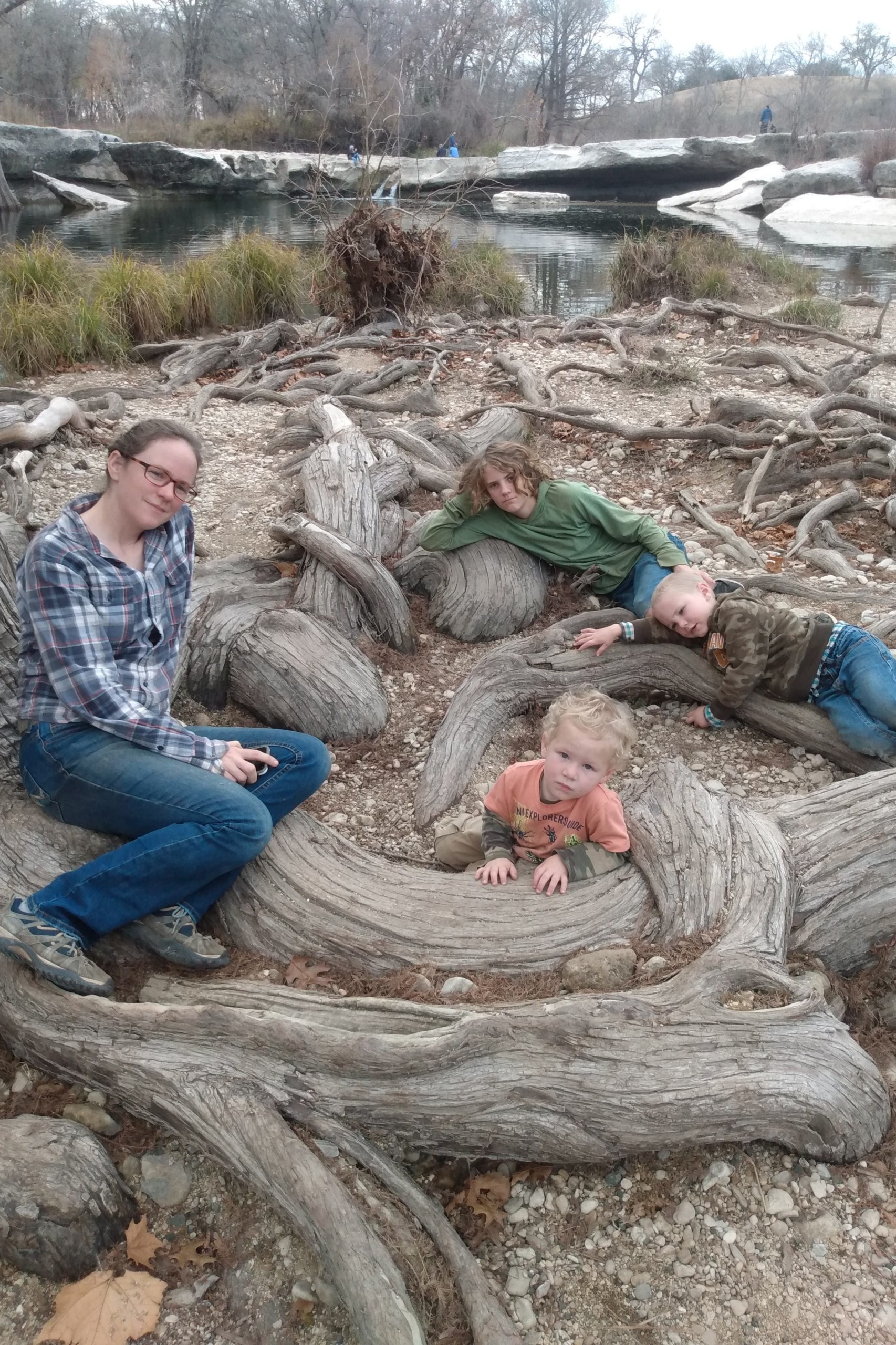 family amongst tree roots texas
